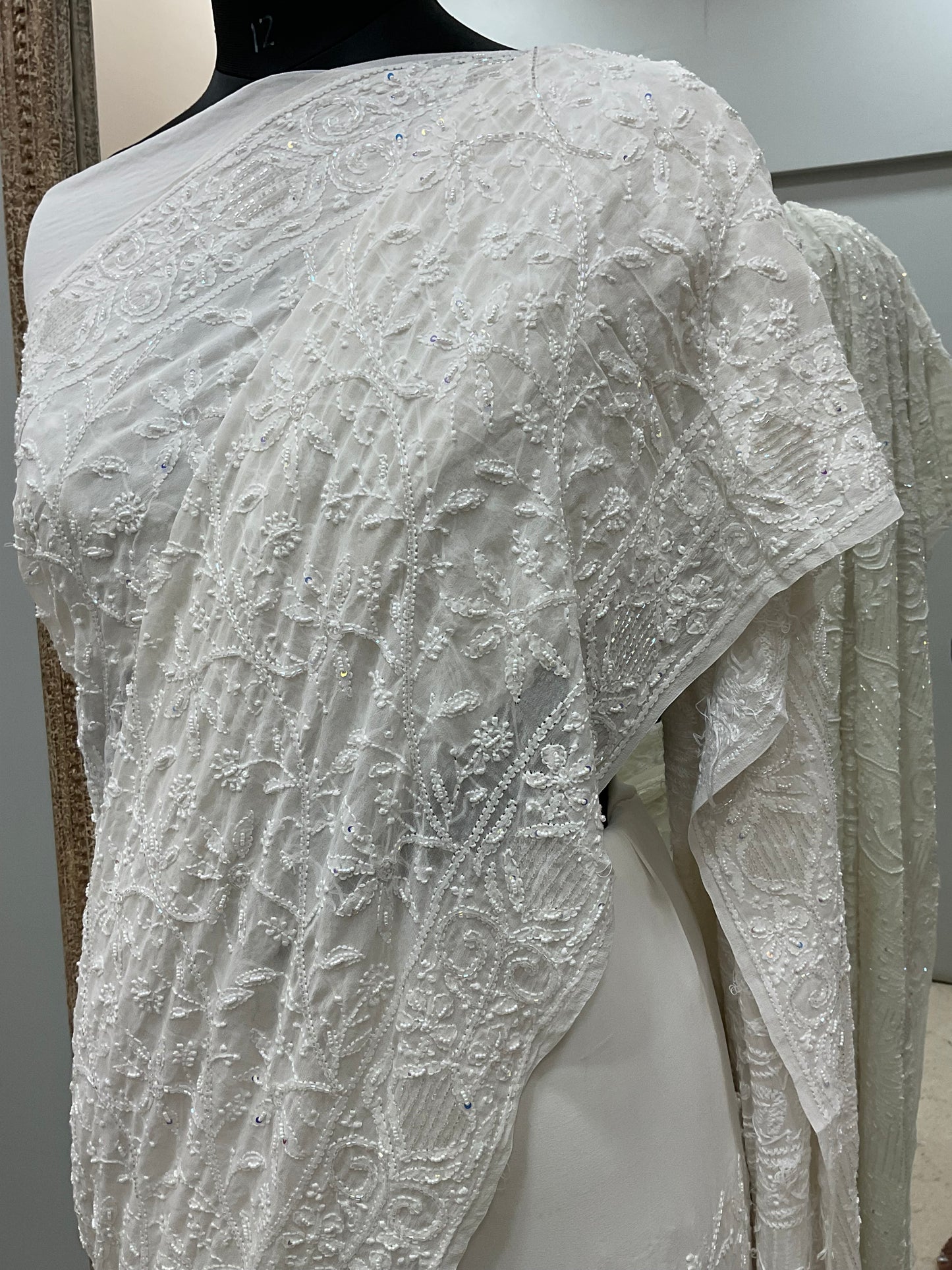 Pure Georgette Saree full jaal with Heavy Cutdana, Pearl and Heavy Sequence White