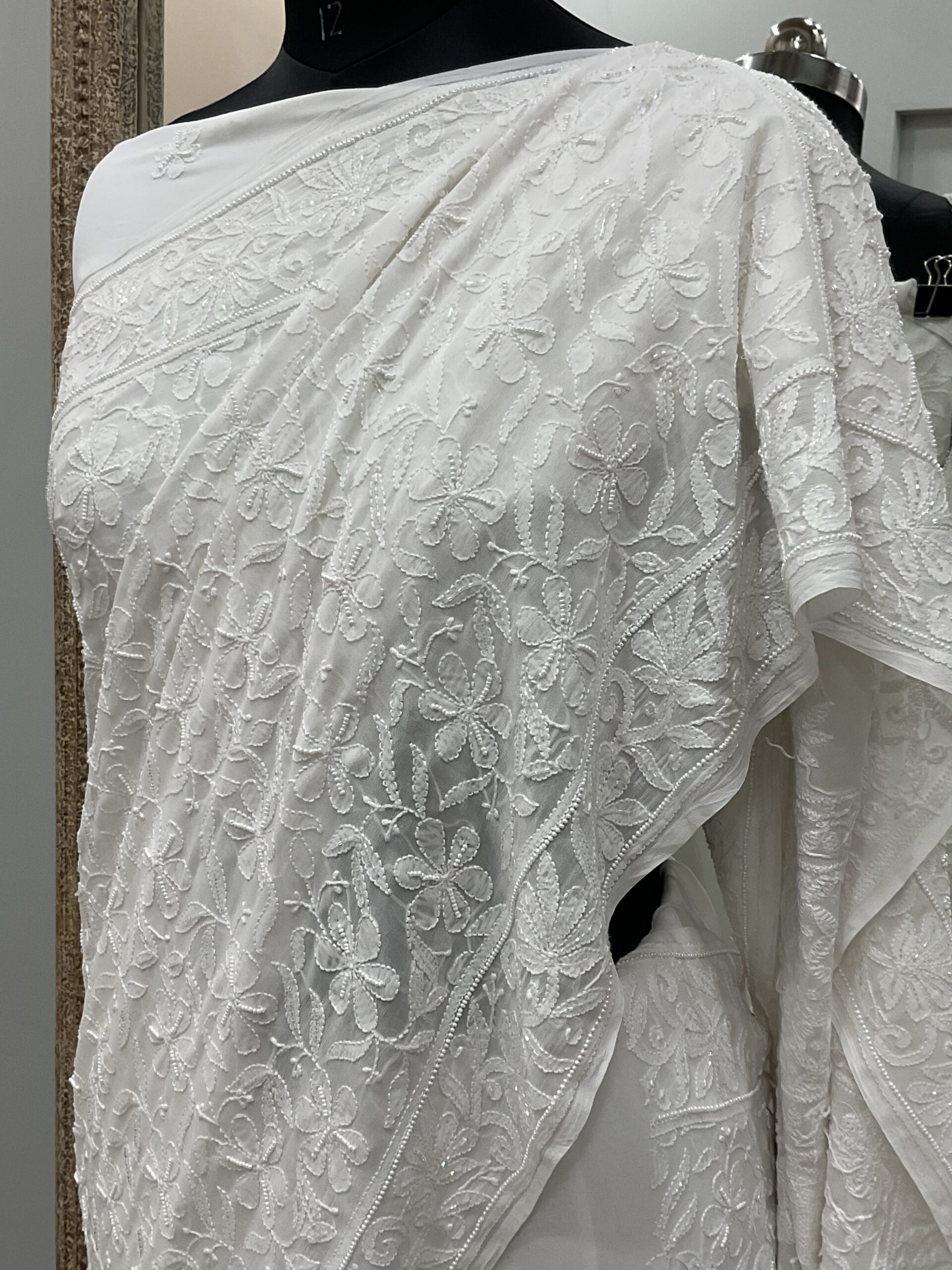 Pure Georgette Saree full jaal with Heavy Cutdana, Pearl and Heavy Sequence White