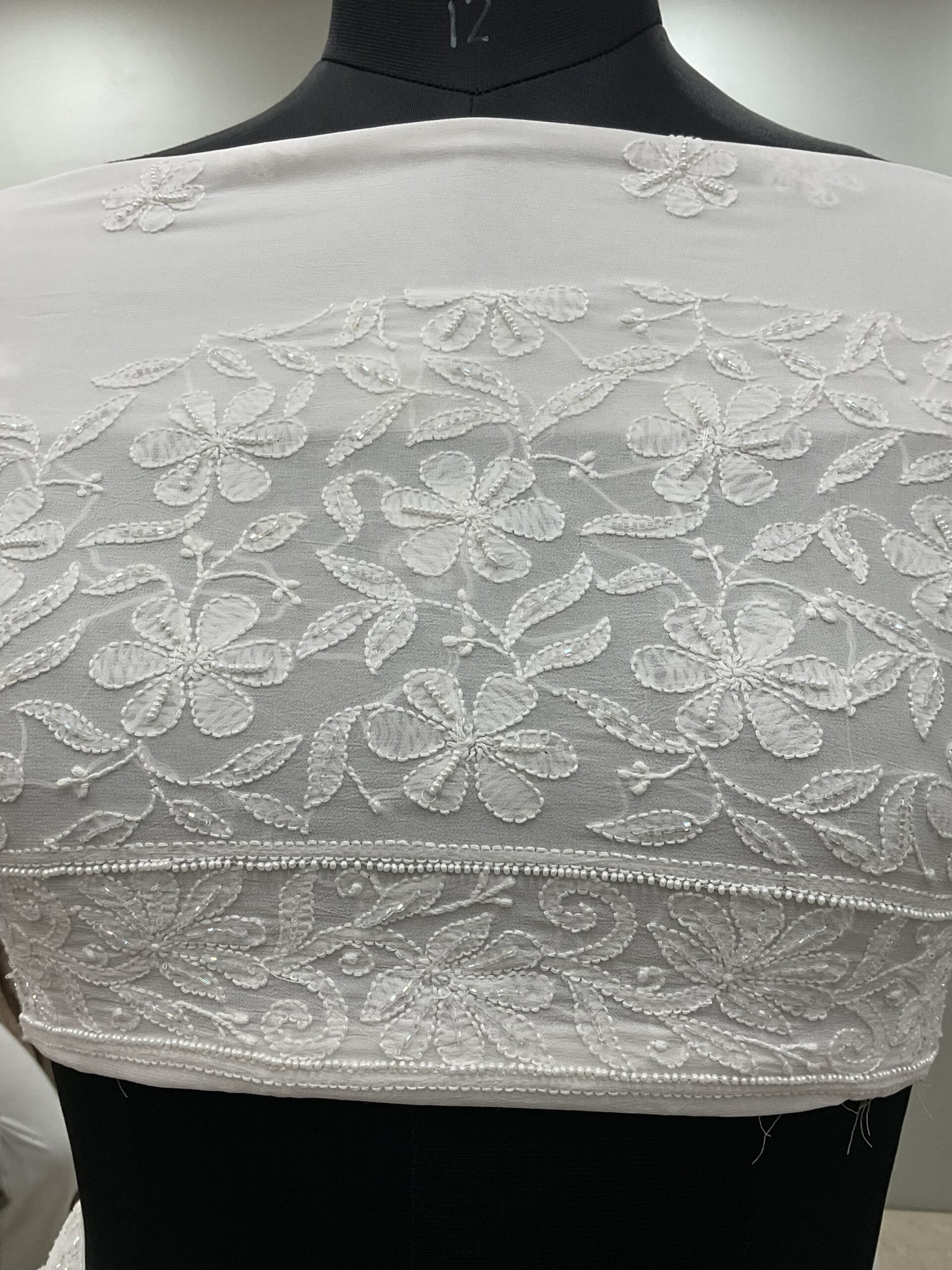 Pure Georgette Saree full jaal with Heavy Cutdana, Pearl and Heavy Sequence White